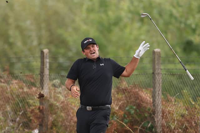 Patrick Reed reacts following his second shot on the ninth hole on day two of the BMW PGA Championship at Wentworth 