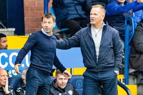 Kilmarnock Manager Neil McCann (L) and Hearts Head Coach Wouter Vrancken