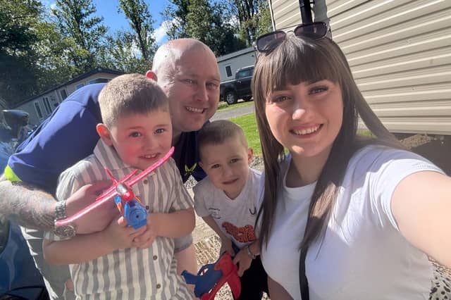 Ian Alexander with his wife Kathleen and sons Sonny, six, and Ollie, four