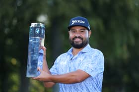 American JJ Spaun shows off the BMW PGA Championship trophy after his dramatic win at Wentworth