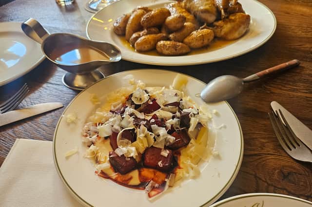 The beetroot, with chicken, potatoes and gravy in background
