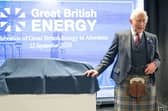 King Charles III unveils a plaque during a visit to the new Great British Energy headquarters in Aberdeen to meet with representatives working across North East Scotland supporting the United Kingdoms energy transition