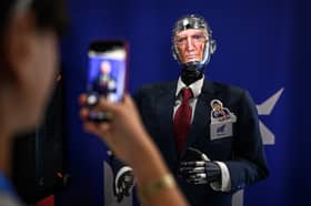 The idea that Donald Trump has been replaced by a robot as part of a sinister plot by artificial intelligence to take over the world is a bogus conspiracy theory waiting to happen (Picture: Fabrice Coffrini)