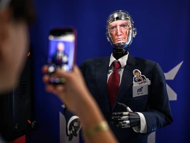 The idea that Donald Trump has been replaced by a robot as part of a sinister plot by artificial intelligence to take over the world is a bogus conspiracy theory waiting to happen (Picture: Fabrice Coffrini)
