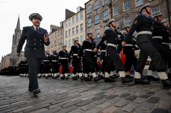 Sailors from HMS Queen Elizabeth march on Edinburgh's Royal Mile earlier this month (Picture: Jeff J Mitchell)
