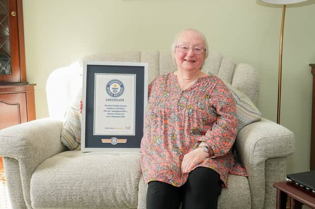 Gaming gran Cath Bowie, 78, with her Guinness World Records title