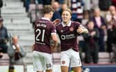 Hearts' Calvin Miller (R) celebrates with James Wilson (L) after scoring from the penalty spot to make it 6-2 during a Premier Sports Cup Second Round match against Inverness Caledonian Thistle 