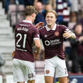 Hearts' Calvin Miller (R) celebrates with James Wilson (L) after scoring from the penalty spot to make it 6-2 during a Premier Sports Cup Second Round match against Inverness Caledonian Thistle 