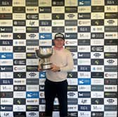 Craig Ross shows off the trophy after winning the St Andrews Classic presented by Petrasco