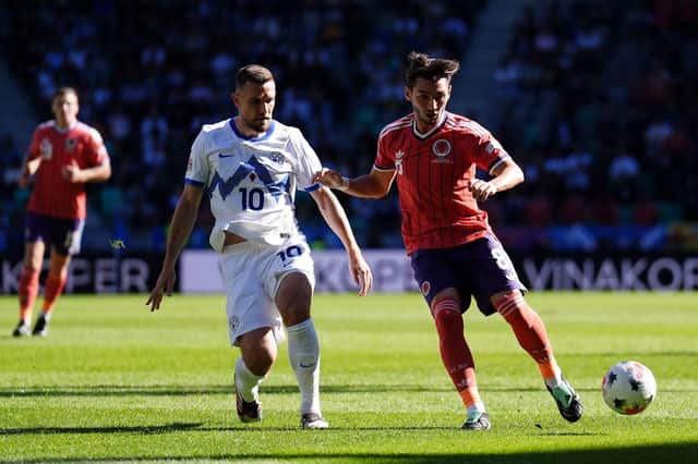 Scotland's Billy Gilmour (right) and Slovenia's Timi Elsnik battle for the ball during the Nations League B1 match at Stadion Stozice in Ljubljana.
