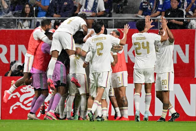 Kelsy celebrates his first international goal with his Venezuela teammates in Hiroshima, Japan.