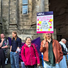 Staff formed a picket line outside of the university's Old College 