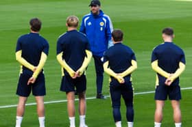 Scotland head coach Sebastien Pocognoli addresses his players during a training session at Hampden on Monday.  (Photo by Craig Foy / SNS Group)