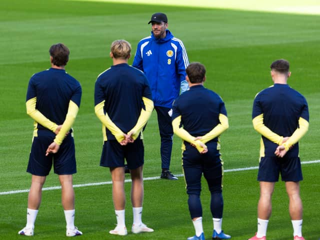 Scotland head coach Sebastien Pocognoli addresses his players during a training session at Hampden on Monday.  (Photo by Craig Foy / SNS Group)