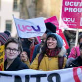 Members of the University and College Union take part in a protest outside the Scottish Parliament in Edinburgh in November 2022