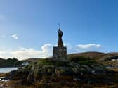 The new statue of Saint Barr pictured from the boat