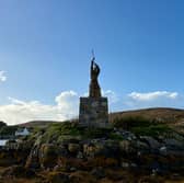 The new statue of Saint Barr pictured from the boat