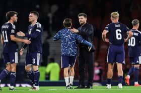 Scotland head coach Sebastien Pocognoli addresses his players after the 3-0 defeat by Switzerland.