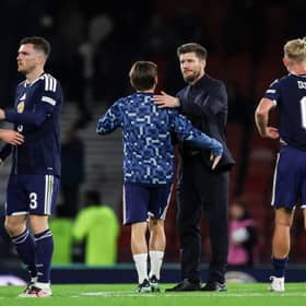 Scotland head coach Sebastien Pocognoli addresses his players after the 3-0 defeat by Switzerland.