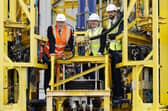 First Minister John Swinney, left, during a visit to the Port of Montrose for an announcement on a major expansion in offshore wind this week