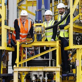 First Minister John Swinney, left, during a visit to the Port of Montrose for an announcement on a major expansion in offshore wind this week