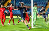 James Wilson celebrates Scotland Under-21’s third goal in the European Championship qualifier against Azerbaijan at Rugby Park, Kilmarnock. Cr: SNS Group.