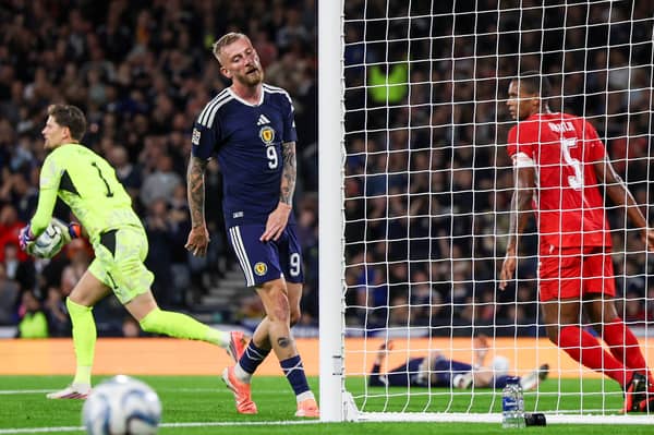 Scotland striker Oli McBurnie looks dejected during the 3-0 defeat by Switzerland at Hampden on Tuesday.  (Photo by Craig Williamson / SNS Group)