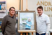 Bob MacIntyre and John Kelly show off the portrait immortalising his win in last year’s Alfred Dunhill Links Championship
