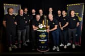Lee Miller, David Clarkson, Cillian Sheridan, Gary Harkins, Tom Boyd, Gerry Britton, Christophe Berra, Ian Durrant, Richard Tait, Scott Allan and Hugh Murray (L-R) with the Tennent's Sixes Trophy during a media event to promote the upcoming tournament at Braehead Arena