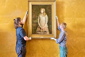 Technicians hang Sir John Everett Millais painting  Sweetest Eyes That Were Ever Seen at Duff House.