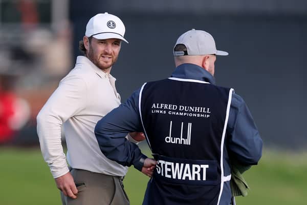 Michael Stewart and his caddie Stewart Muir interact during the Alfred Dunhill Links Championship