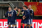 Kieron Bowie and John McGinn scored in Scotland's 2-0 win over North Macedonia in Skopje.