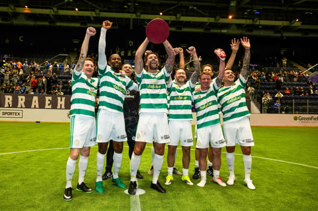 Celtic celebrate winning the Tennants Sixes following the 5-4 win over Rangers in the final at Braehead Arena. (Photo by Craig Foy / SNS Group)