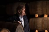 Sir Kenny Dalglish with Gordon & MacPhail Casks during visit to Elgin