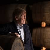 Sir Kenny Dalglish with Gordon & MacPhail Casks during visit to Elgin