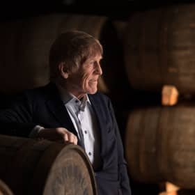Sir Kenny Dalglish with Gordon & MacPhail Casks during visit to Elgin