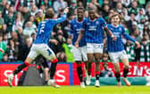 Rangers' Olwethu Makhanya (C) celebrates with Emmanuel Fernandez (L) 