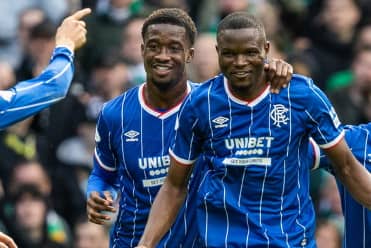 Rangers' Olwethu Makhanya (C) celebrates with Emmanuel Fernandez (L)