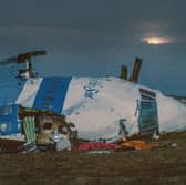 Wreckage of Pan Am flight 103 lies in a field near Lockerbie after the bombing in December 1988