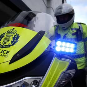 Police Scotland officer and bike