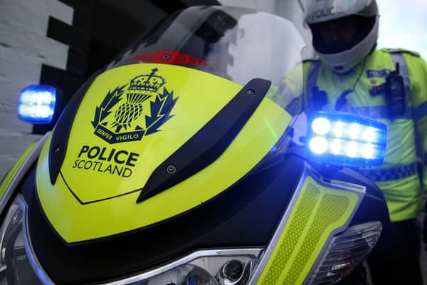 Police Scotland officer and bike