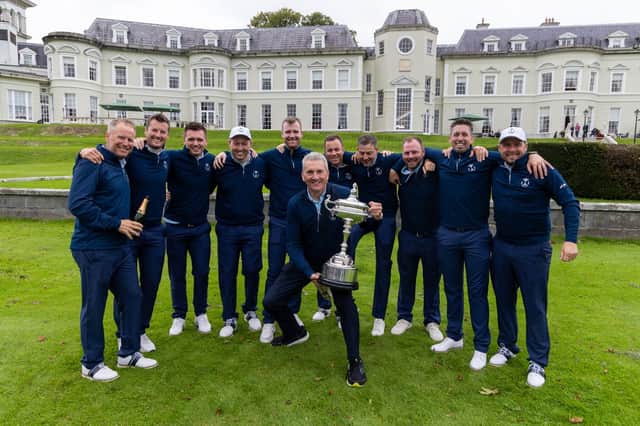 Captain David Scott celebrates with the GB&I players after winning the 32nd PGA Cup