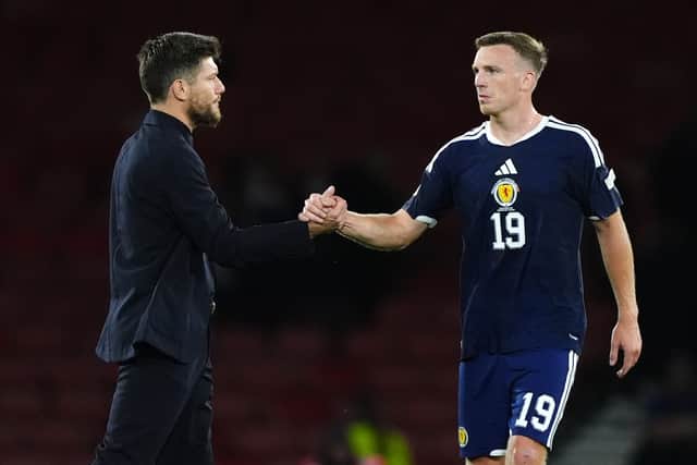 Scotland manager Sebastien Pocognoli greets Lewis Ferguson following the Nations League defeat to Slovenia