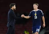 Scotland manager Sebastien Pocognoli greets Lewis Ferguson following the UEFA Nations League, league phase defeat to Slovenia