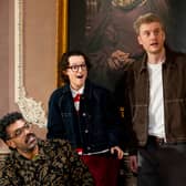 Romesh Ranganathan, Bella Ramsey and James Acaster reacting during breakfast in episode two of The Celebrity Traitors. 