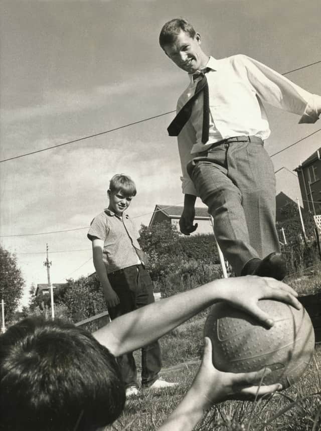 Alex Ferguson having a kickabout with local children in the 1960s while at St Johnstone.