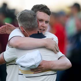 European captain Luke Donald hugs Bob MacIntyre during the Sunday singles matches at the 2025 Ryder Cup in New York 