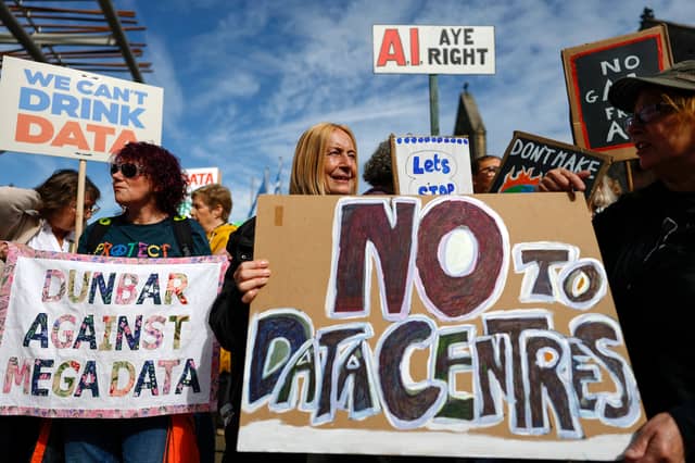 Activists protest against data centres outside the Scottish Parliament last month (Picture: Jeff J Mitchell)