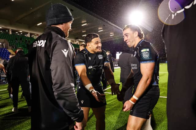 Sione Tuipulotu and Josh McKay enjoy the moment after Glasgow Warriors' win over Connacht at Scotstoun Stadium in the United Rugby Championship.