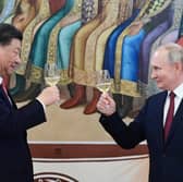 Chinese president Xi Jinping toasts blood-soaked Russian despot Vladimir Putin during a visit to the Kremlin in 2023 (Picture: Pavel Byrkin)